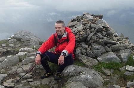 Jonathan Appleby on the summit cairn of Creag a'Mhaim