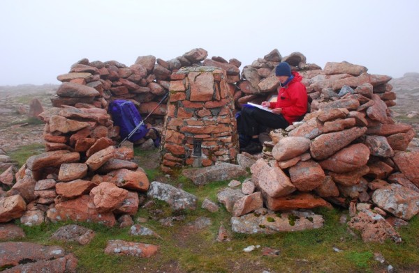 Frances Wilson browses Ronas Hill library (photo: Peter Wilson)